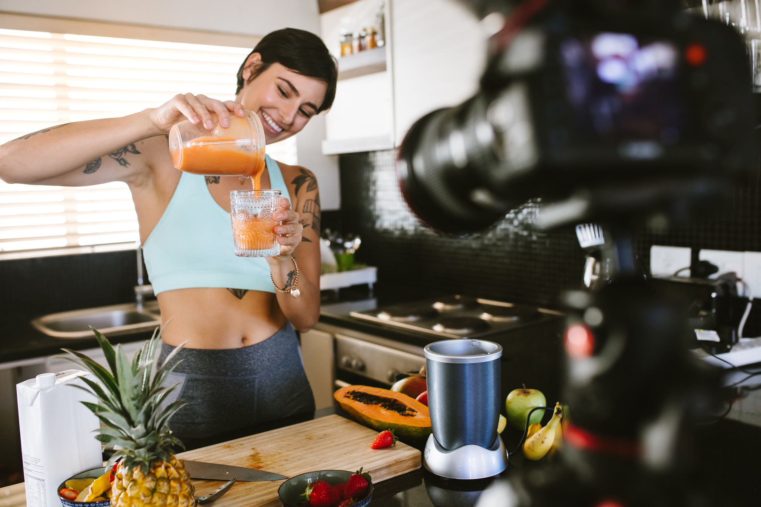 Healthy eating blogger filming new podcast about smoothie